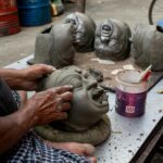 Hands of tradition and Idol Making in Progress